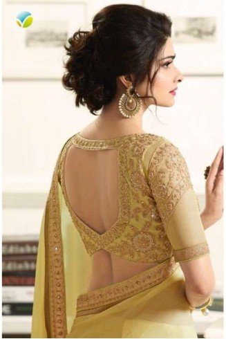  Yellow Saree With Contrast Cream Blouse  