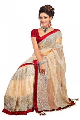 Z Cream embroidred net designer half saree with blouse